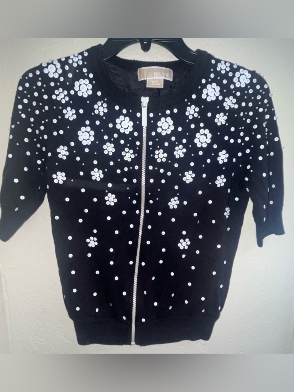 Michael Kors Black Short-Sleeve Zip Sweater with White Sequin Floral Accents
